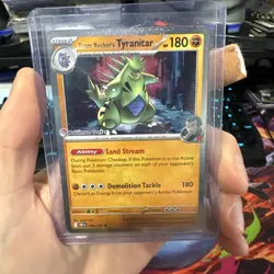 Team Rocket's Tyranitar 096/182 Sealed Promo Card | Pokemon Center Stamp - Image 1