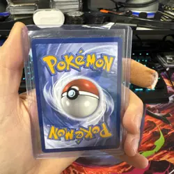 Team Rocket's Tyranitar 096/182 Sealed Promo Card | Pokemon Center Stamp - Image 2