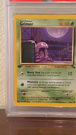 1999 Pokemon Fossil #48 Grimer 1st Edition PSA 8 NM-MT - Image 2