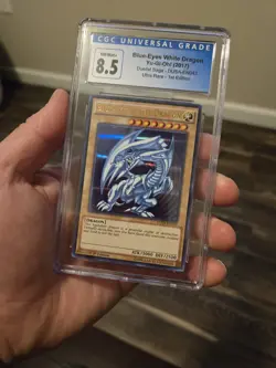 yugioh cgc 8.5 PSA DUSA-EN043 Blue-Eyes White Dragon Ultra Rare 1st Edition 2017 - Image 1