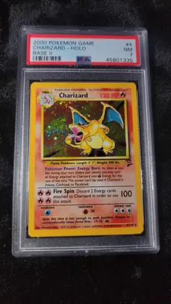 Pokemon Charizard Holo Rare Card #4 Base Set 2, PSA 7 Near Mint - Image 1