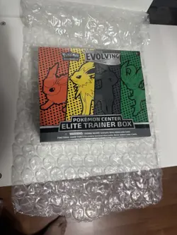 2021 Pokemon Evolving Skies Pokemon Center Sealed ETB - Damaged(two Tiny Holes ) - Image 1