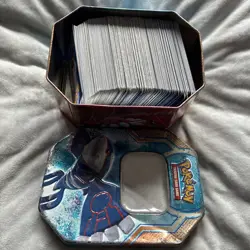Full Tin Of Pokemon Cards 300+ No Energy/Code Cards Mixed Age TCG Xmas Gift (2) - Image 1