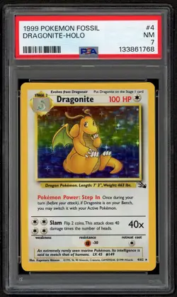 1999 POKEMON FOSSIL #4 DRAGONITE-HOLO PSA 7 NM - Image 1