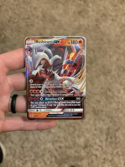 Reshiram GX SM137 Sun & Moon Ultra Rare Holo Black Star Promo Pokemon Card - Image 1