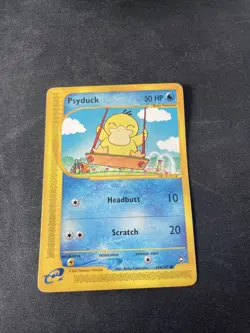 Pokemon TCG Aquapolis Psyduck Card 104/147 Regular E-Reader Version - Image 1