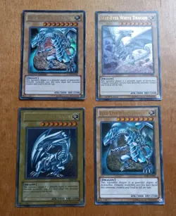 YUGIOH Blue Eyes White Dragon Lot Of 4 SDBE-EN001 SDK-001 MVP1-EN055 LC01-EN004 - Image 1