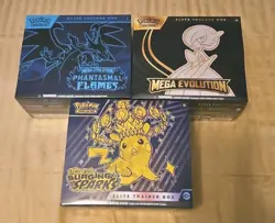 Pokemon Lot Of 3 ETB: Phantasmal Flames, Mega Evolution & Surging Sparks Sealed - Image 1