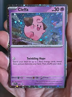 POKEMON CLEFFA SVP095 BLACK STAR PROMO COSMOS HOLOFOIL WITH SWIRL NM CARD - Image 1