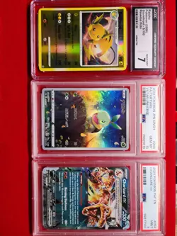 Ultra Rare Graded Pokemon Card Slabs ( Charizard, Japanese Turtwig and Raichu) - Image 1