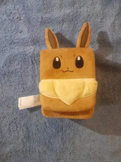 Pokemon Prismatic Evolutions Eevee Card Box Plush Holder Accessory - Image 1