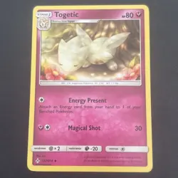 Togetic 137/214 Sm-Unbroken Bonds Regular Pokemon TCG LP 2019 - Image 1
