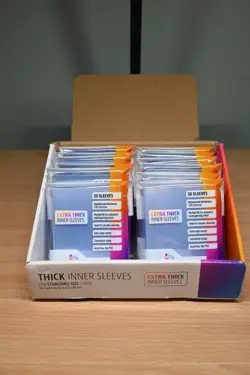 GameGenic Thick Inner Card Sleeves Partial Box of 12 Packs of 50 Sleeves - Image 1