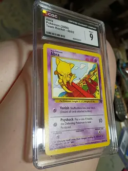 PSA 9 MINT Abra 49/82 1st Edition Team Rocket Set Pokemon Card - Image 1