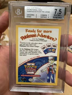 BGS 7.5 Team Rocket 2000 Promotional Pokemon Card Team Rocket's on the Loose! - Image 1