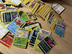 Pokemon Cards In A Pokemon TCG Surging Sparks Collector's Lunch Box Tin - Image 2