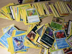 Pokemon Cards In A Pokemon TCG Surging Sparks Collector's Lunch Box Tin - Image 3