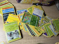 Pokemon Cards In A Pokemon TCG Surging Sparks Collector's Lunch Box Tin - Image 5
