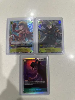 One Piece TCG Luffy And Zoro Egghead Sealed Promo cards NM + Dracule Mihawk - Image 1