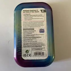 Pokemon TCG Prismatic Evolutions Sealed Mini Tin Vaporeon Sealed *Dented* - Image 2
