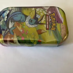 Pokemon TCG Prismatic Evolutions Sealed Mini Tin Vaporeon Sealed *Dented* - Image 3