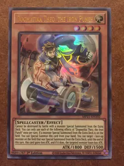 Dogmatika Theo The Iron Punch Ultra Rare MP21-EN102 - Image 1