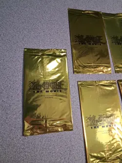 Yu-Gi-Oh The Movie 2004 Gold Promo - 5 Packs Sealed New/Factory Sealed - Image 1