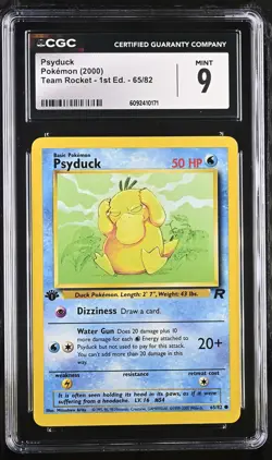 CGC 9 MINT Psyduck 2000 Team Rocket 1st Edition 65/82 Pokemon Card - Image 1