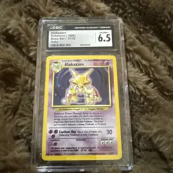 CGC 6.5 MINT Alakazam Base Set 2 1/130 Holo 1999 Pokemon Card - Image 1