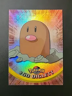 NM! 1999 Topps Pokemon TV Animation #50 Diglett RAINBOW FOIL BLUE Logo - Image 1