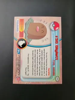 NM! 1999 Topps Pokemon TV Animation #50 Diglett RAINBOW FOIL BLUE Logo - Image 2