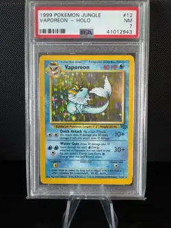 1999 Pokemon TCG | Vaporeon Holo 12/64 | Jungle | PSA 7 NM - Image 1