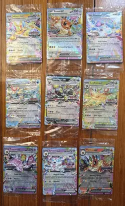 Prismatic Evolutions Surprise Box Sealed Stamped EX Promo Cards 9/9 Complete Set - Image 1