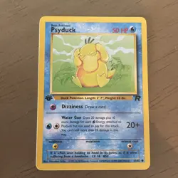 1st Edition Psyduck 65/82 Team Rocket Pokemon Card Near Mint NM WOTC - Image 1