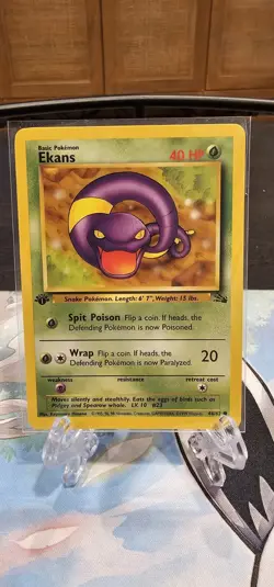 Ekans 46/62 First Edition Fossil Pokemon 1999 NM - Image 1