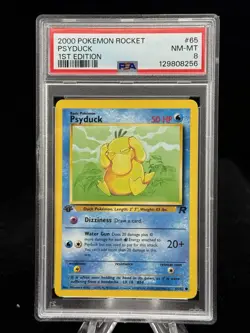 Psyduck #65 1st Edition Team Rocket 2000 Pokemon PSA 8 ?? - Image 1