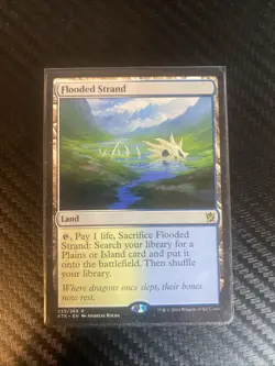 Flooded Strand Khans of Tarkir Regular - Image 1