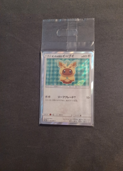 Pokemon Poncho-Wearing Eevee Leafeon 142/SM-P Japanese Promo (Sealed) - Image 1