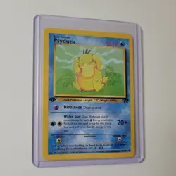 Psyduck 65/82 Team Rocket 1st Edition Pokemon Card WOTC NM-Mint - Image 1