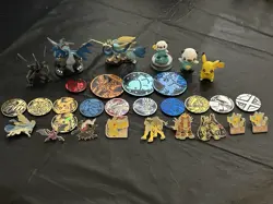 Pokemon Metal Pins, Plastic Coins, & Small Figurines Lot - Image 1