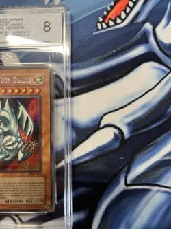 YuGiOh 2002 Blue-Eyes Toon Dragon SRL-G000 PGS 8 1st Edition Secret Rare German - Image 2