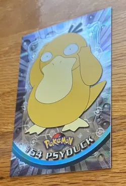 1999 Topps Pokemon TV Animation PSYDUCK #54 Texture Holo Silver Foil Black Logo - Image 1