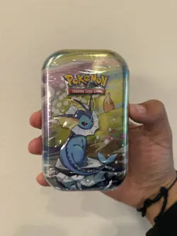 Pokemon TCG - Prismatic Evolutions Mini Tin (Vaporeon) Factory Sealed - Image 1