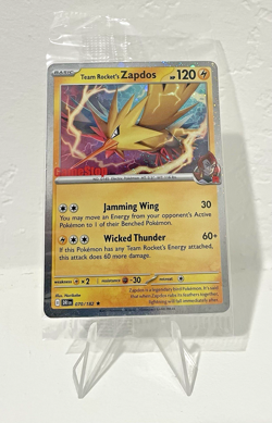 Pokemon: Team Rocket’s Zapdos 070/182 GameStop Promo Stamp Sealed - Image 1