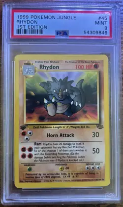 1999 Pokemon Jungle Rhydon 1st Edition 45/64 PSA 9 - Image 1