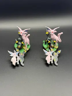 Set Of (2) Pokemon TCG - Prismatic Evolutions Figure Collection Pin and Figurine - Image 1