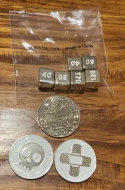 Pokemon TCG Metal Dice and Charizard Commemorative Coin Set UPC - Image 1