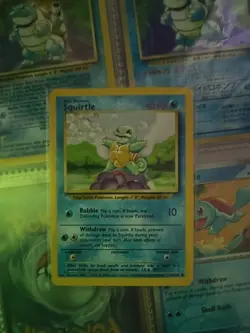 Squirtle 63/102 LP Unlimited 1999 Base Set Pokemon Card WOTC Vintage - Image 1