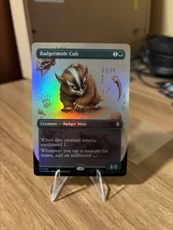 [NM] Magic the Gathering Badgermole Cub (Borderless Foil) [M 0326] - Image 1