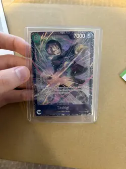 Tashigi OP12-031 Treasure Cup 2025 Prize Promo One Piece Card English TOP 16 - Image 1